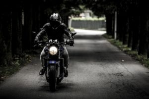 motorcyclist in forest