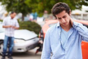 Teenage Driver Suffering Whiplash Injury Traffic Accident